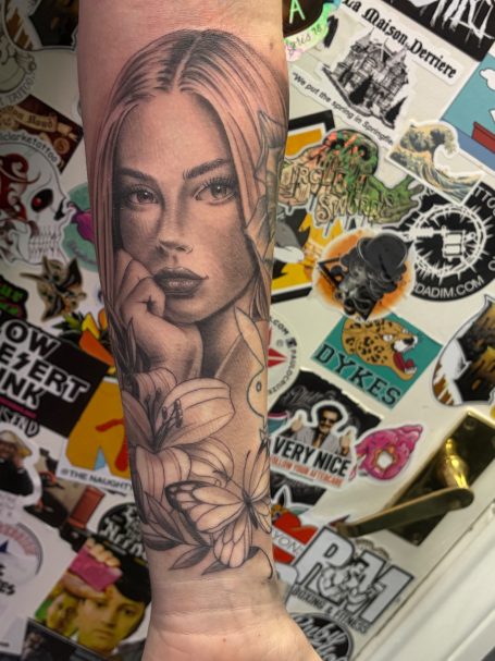 Detailed black and grey womans  portrait tattoo  by black bones custom tattoos in Warrington 